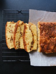 sliced cinnamon swirl pound cake loaf on counter